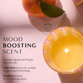 "MOOD BOOSTING CANDLE. Complex blend of 7 pure essential oils. Wild mint known for cooling invigorating & refreshing. Mandarin known for its uplifting nature"